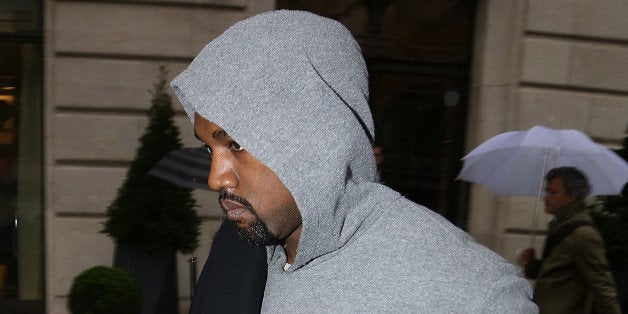 PARIS, FRANCE - SEPTEMBER 29: Kanye West leaves the 'Art District' apartments on September 29, 2014 in Paris, France. (Photo by Marc Piasecki/GC Images)