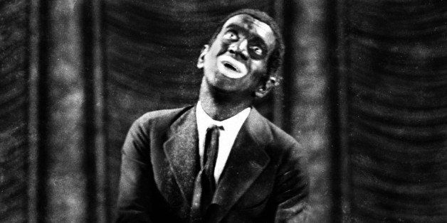 FILE - This 1927 image originally released by Warner Bros., shows Al Jolson in blackface makeup in the movie "The Jazz Singer." Historically, blackface emerged in the mid-19th century, representing a combination of put-down, fear and morbid fascination with black culture. Among the most prominent examples: Al Jolson and Eddie Cantor. Today, thereâs a fine line between mockery and tribute. (AP Photo/Warner Bros.)