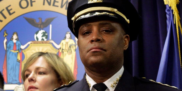 New York Attorney General Eric Schneiderman, is joined by New York City Police Dept. Chief of Department Philip Banks during a news conference, in New York, Thursday, Jan. 30, 2014. Police were rounding up 18 people in New York City on Thursday on allegations they sold "party packs" of cocaine and sex to high-end clients and texted their customers to advertise ahead of this week's Super Bowl festivities. (AP Photo)