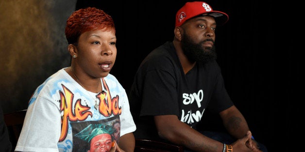 The parents of Michael Brown, Lesley McSpadden, left, and Michael Brown, Sr., right, sit for an interview with The Associated Press in Washington, Saturday, Sept. 27, 2014. Michael Brown's parents say they are unmoved by the Ferguson police chief's apology in their son's shooting death by a police officer. Instead, Lesley McSpadden and Michael Brown Sr. told The Associated Press they would rather see an arrest, and Brown Sr. said he wants the police officer "in handcuffs." (AP Photo/Susan Walsh)