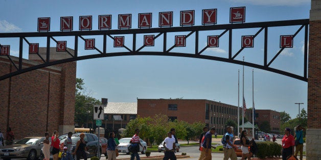 WELLSTON, MO - AUGUST 21:Students leave Normandy High School at the end of the school day as the drama of the killing of 18-year-old Michael Brown by white police officer Darren Wilson on August 9 in Ferguson, MO, plays itself out on Thursday, August 21, 2014, in Wellston, MO. Normandy is a statistically troubled high school that graduated Michael Brown. The school has the difficult task of raising young black males in an area notorious for racial profiling and unequal treatment at the hands of law enforcement.(Photo by Jahi Chikwendiu/The Washington Post via Getty Images)