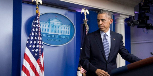 President Barack Obama leaves the Brady Press Briefing Room at the White House in Washington, Monday, Nov. 24, 2014, after the Ferguson grand jury decided not to indict police officer Darren Wilson in the shooting death of Michael Brown. (AP Photo/Manuel Balce Ceneta)