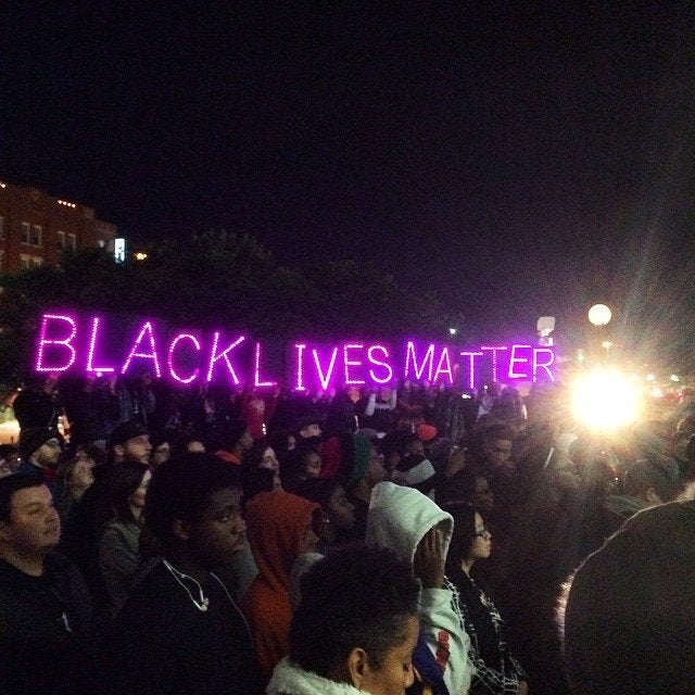 People protest the Darren Wilson Grand Jury decision in Dallas, Texas, on November 25, 2014.
