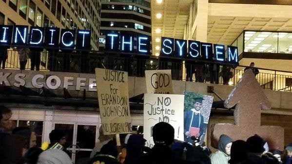 People protest the Darren Wilson Grand Jury decision in Milwaukee, Wisconsin on November 25, 2014.