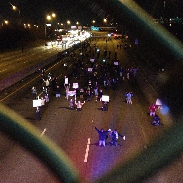 People protest the Darren Wilson Grand Jury decision in Cincinnati, Ohio, on November 25, 2014.