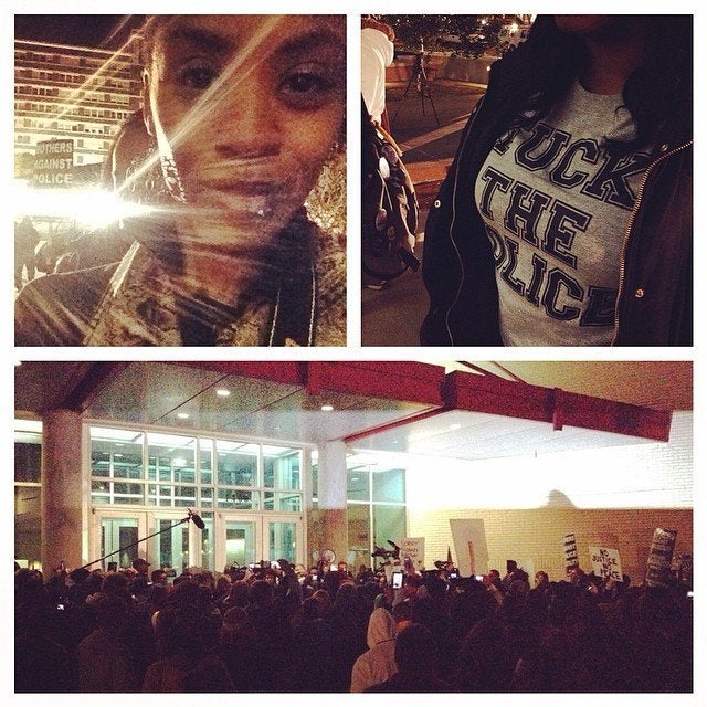 People protest the Darren Wilson Grand Jury decision in Dallas, Texas on November 25, 2014