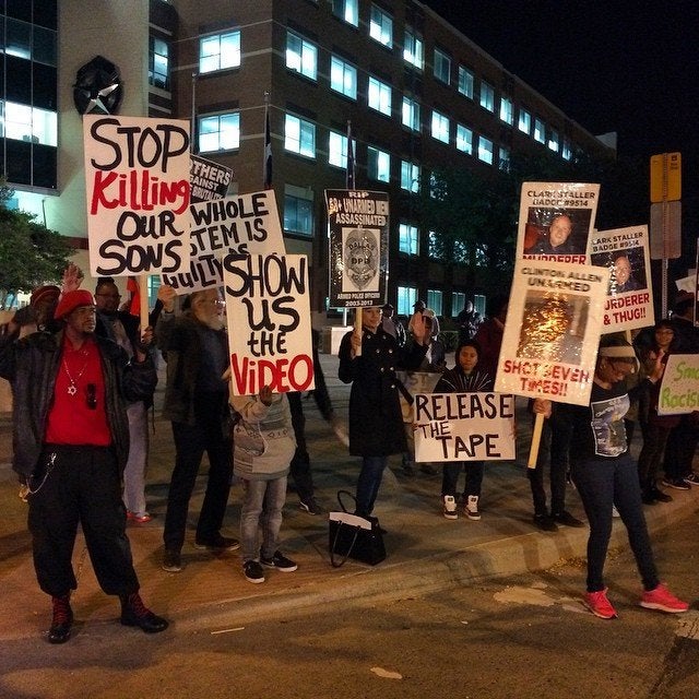 People protest the Darren Wilson Grand Jury decision in Dallas, Texas, on November 25, 2014.
