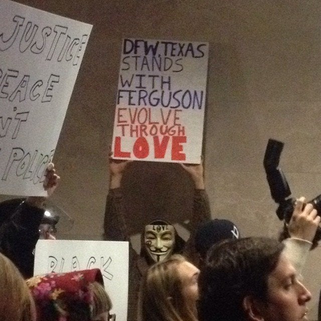 People protest the Darren Wilson Grand Jury decision in Dallas, Texas, on November 25, 2014.