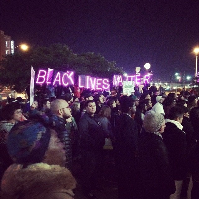 People protest the Darren Wilson Grand Jury decision in Dallas, Texas, on November 25, 2014.