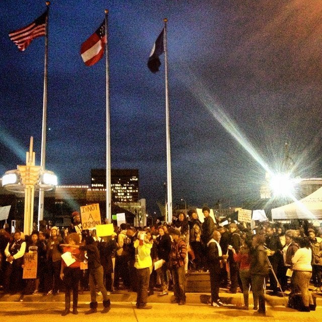 People protest the Darren Wilson Grand Jury decision in Atlanta, Georgia, on November 25, 2014.