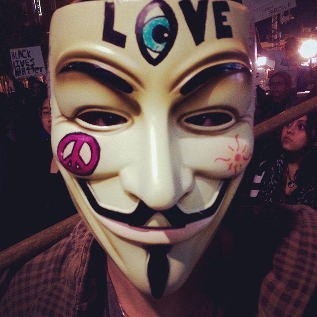 People protest the Darren Wilson Grand Jury decision in Dallas, Texas, on November 25, 2014.