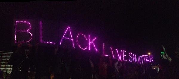 People protest the Darren Wilson Grand Jury decision in Dallas, Texas, on November 25, 2014.