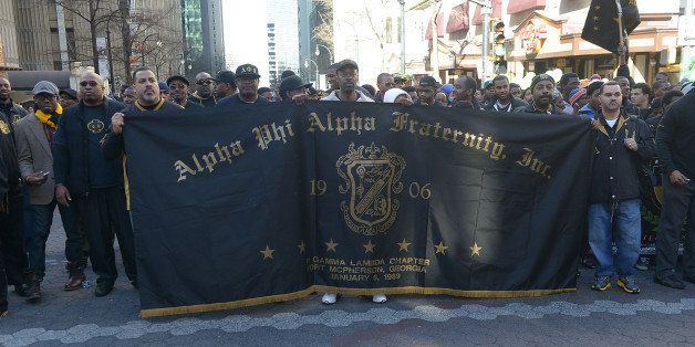 ATLANTA, GA - JANUARY 20: Members of Alpha Phi Alpha Fraternity, Inc. participates in the 2014 Martin Luther King, Jr. March & Rally at Peachtree Street on January 20, 2014 in Atlanta, Georgia. (Photo by Paras Griffin/Getty Images)