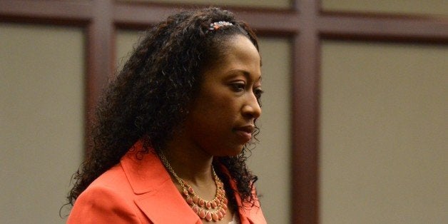 Marissa Alexander enters the courtroom for a hearing on Tuesday, June 10, 2014 in Jacksonville, Fla. Circuit Judge James Daniel set a hearing for August 1 on whether Alexander should be granted a second stand your ground self-defense hearing. Daniel also set a new tentative date of Dec. 1 for Alexanderâs second trial on aggravated assault with a deadly weapon charges. Alexander, 33, was convicted in May 2012 of three counts of aggravated assault with a deadly weapon and was sentenced to 20 years in prison under the stateâs minimum mandatory requirements. Alexander says she acted in self-defense after her estranged husband beat her. The warning shots were fired near her husband and his two children. (AP Photo/The Florida Times-Union, Bob Mack, Pool)