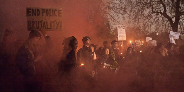 LONDON, UNITED KINGDOM - 2014/11/26: People gather outside the US embassy in Central London, supporting the portests in Ferguson. (Photo by Andrea Baldo/LightRocket via Getty Images)