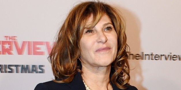 Sony Pictures Chair Amy Pascal arrives for the premiere of the film 'The Interview' at The Theatre at Ace Hotel in Los Angeles, California on December 11, 2014. The film, starring US actors Seth Rogen and James Franco, is a comedy about a CIA plot to assassinate its leader Kim Jong-Un, played by Randall Park. North Korea has vowed 'merciless retaliation' against what it calls a 'wanton act of terror' -- although it has denied involvement in a massive cyber attack on Sony Pictures, the studio behind the film. AFP PHOTO/STR (Photo credit should read -/AFP/Getty Images)