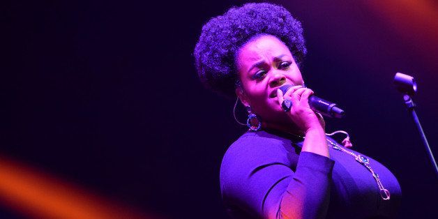 LOS ANGELES, CA - JUNE 27: Singer Jill Scott performs onstage at the Maxwell, Jill Scott, Marsha Ambrosius and Candice Glover concert during the 2014 BET Experience At L.A. LIVE at Staples Center on June 27, 2014 in Los Angeles, California. (Photo by Earl Gibson/BET/Getty Images for BET)