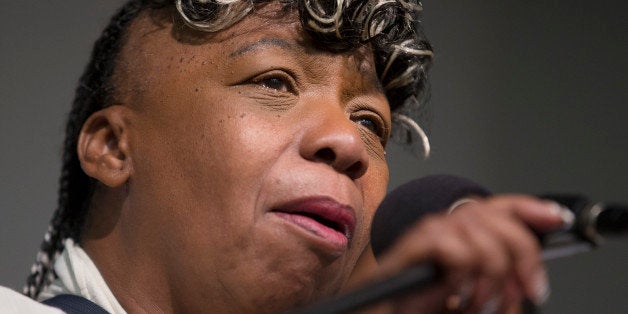 Gwen Carr, mother of Eric Garner, speaks during a rally at the National Action Network headquarters, Saturday, July 26, 2014, in New York. Eric Garner, 43, died on Thursday, July 18, during an arrest in Staten Island, when a plain-clothes police officer placed him in what appeared be a choke hold while several others brought him to the ground and struggled to place him in handcuffs. (AP Photo/John Minchillo)