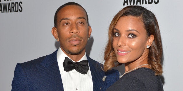 HOLLYWOOD, CA - AUGUST 22: Honoree Chris 'Ludacris' Bridges (L) and Eudoxie Agnan attend the 2014 BMI R&B/Hip-Hop Awards at