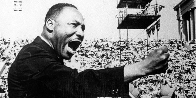 American Civil Rights and religious leader Dr Martin Luther King Jr (1929 - 1968) gestures emphatically during a speech at a Chicago Freedom Movement rally in Soldier Field, Chicago, Illinois, July 10, 1966. (Photo by Afro American Newspapers/Gado/Getty Images)