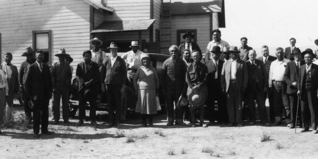 17th June 1930: Native American Indians who attended a meeting with the Assistant Commissioner of Indian Affairs Mr Scattergood and the Superintendent of Klamath Indian Reservation at Beatty in Oregon. (Photo by MPI/Getty Images)