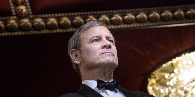 Chief Justice of the US Supreme Court John Roberts listens during the 37th Kennedy Center Honors at the Kennedy Center Decemb