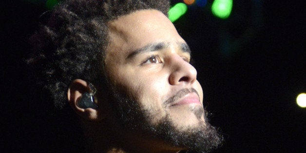 INGLEWOOD, CA - DECEMBER 05: J. Cole performs during Power 106.1 Cali Christmas at The Forum on December 5, 2014 in Inglewood, California. (Photo by Tim Mosenfelder/Getty Images)