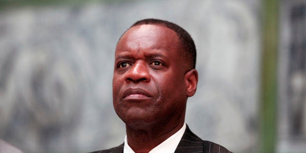 DETROIT, MI - JUNE 9: Detroit Emergency Manager Kevyn Orr waits to speak at a press conference at the Detroit Institute of Arts June 9, 2014 in Detroit, Michigan. It was announced at a press conference that Ford Motor Company, General Motors, and Chrysler were contributing $26 million to a grand bargain fund to help the DIA reach it's $100 million share of the grand bargain fund to help protect its artworks from being sold due to the City of Detroit's bankruptcy. (Photo by Bill Pugliano/Getty Images)