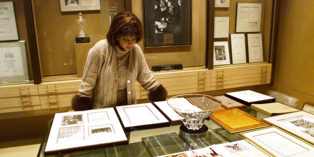 Linda Johnson Rice, president and chief operating officer of Jet magazine, looks over awards and recognitions won by the magazine in its 50-year lifetime Monday, Dec. 10, 2001 at Jet's Chicago headquarters. Johnson is the daughter of Jet founder John. H. Johnson. (AP Photo/Ted S. Warren)