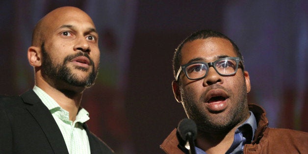 Keegan-Michael Key, left, and Jordan Peele present a College Television Award at the 35th College Television Awards, presented by the Television Academy Foundation at The Leonard H. Goldenson Theatre in the NoHo Arts District on Wednesday, April 23, 2014, in Los Angeles. (Photo by Matt Sayles/Invision for the Television Academy/AP Images)