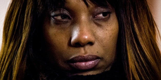 WASHINGTON, DC - DECEMBER 10: Constance Malcolm, whose son was killed by police in New York in 2012, participates in a candlelight vigil outside the Department of Justice in Washington Wednesday December 10, 2014. (Photo by J. Lawler Duggan/For The Washington Post via Getty Images)