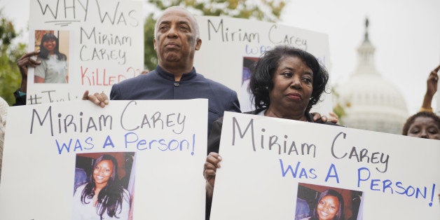 UNITED STATES - OCTOBER 3: Idella Carey, mother of Miriam Carey who was killed last year by Capitol Police, and Charles Barron, protest Carey's death on the West Front of the Capitol, October 3, 2014. Carey was shot and killed by Capitol Police on October 3, 2013, after a high-speed chase. (Photo By Tom Williams/CQ Roll Call)