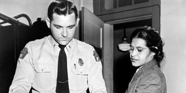 Mrs Rosa Parks, a Negro seamstress, being fingerprinted after her refusal to move to the back of a bus to accommodate a white passenger touched off the bus boycott, Montgomery, Alabama, 1956. (Photo by Underwood Archives/Getty Images)