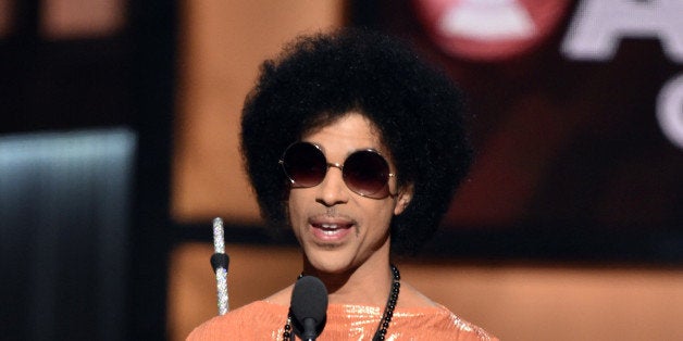 LOS ANGELES, CA - FEBRUARY 08: Recording artist Prince speaks onstage during The 57th Annual GRAMMY Awards at the STAPLES Cen