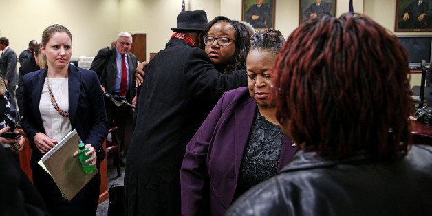 Bernard Bailey's family prepares to leave after a mistrial was declared in Richard Combs' trial on Tuesday, Jan. 13, 2015, inside an Orangeburg County courtroom. (Gerry Melendez/The State/TNS via Getty Images)