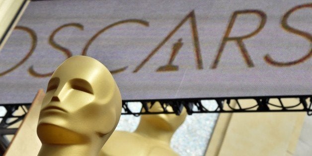 Oscars statues are seen at the red carpet outside the Dolby Theatre as preparations are underway for the 87th annual Academy