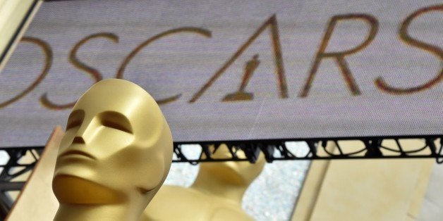 Oscars statues are seen at the red carpet outside the Dolby Theatre as preparations are underway for the 87th annual Academy Awards in Hollywood, California on February 21, 2015. The 87th Oscars take place on February 22 at Hollywood's Dolby Theatre. AFP PHOTO/MLADEN ANTONOV (Photo credit should read MLADEN ANTONOV/AFP/Getty Images)