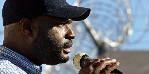 Screenwriter Antwone Fisher speaks to about 500 incarcerated students Friday, Jan. 17, 2003, at Central Juvenile Hall School in Los Angeles. The feature film, "Antwone Fisher," and a memoir, "Finding Fish," have been incorporated into the Los Angeles County Probation Department student curriculum. Fisher's visit is part of the "Inside OUT Writing Program," were professional journalists teach writing skills to students. (AP Photo/Damian Dovarganes)