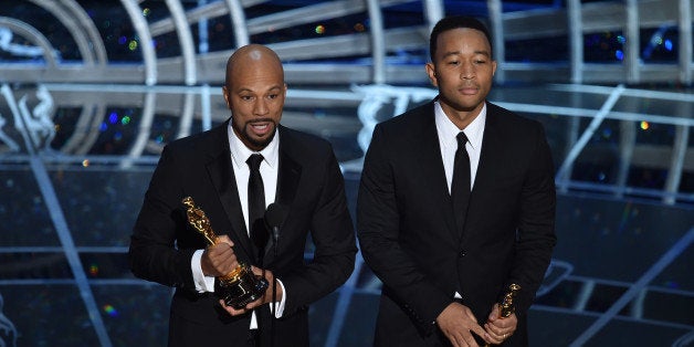HOLLYWOOD, CA - FEBRUARY 22: Lonnie Lynn aka Common and John Stephens aka John Legend accept the Best Original Song Award fo