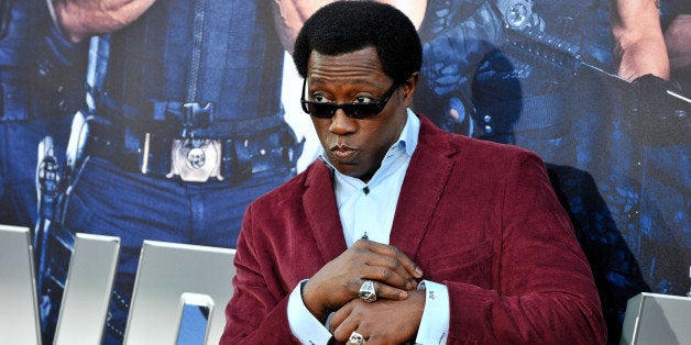 HOLLYWOOD, CA - AUGUST 11: Actor Wesley Snipes arrives at the Los Angeles premiere of Lionsgate Films' 'The Expendables 3' at TCL Chinese Theatre on August 11, 2014 in Hollywood, California. (Photo by Allen Berezovsky/Getty Images)