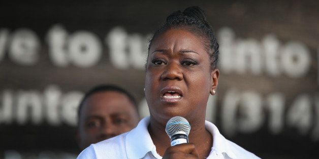 ST. LOUIS, MO - AUGUST 24: Sybrina Fulton, the mother of Trayvon Martin, speaks at Peace Fest in Forest Park on August 24, 2014 in St. Louis, Missouri. Fulton's teenage son was shot and killed by neighborhood watch captain George Zimmerman. Michael Brown, whose teenage son Michael was shot and killed by a police officer in nearby Ferguson, Missouri on August 9, also spoke at the event. Michael Brown Jr. will be buried tomorrow. (Photo by Scott Olson/Getty Images)