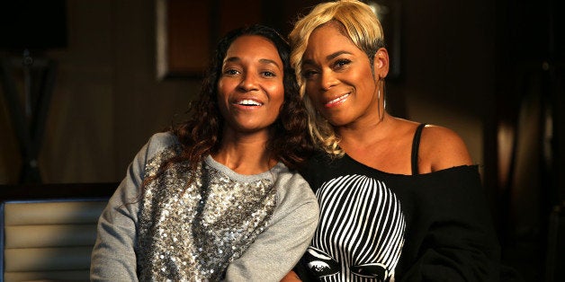 SYDNEY, AUSTRALIA - JUNE 5: (EUROPE AND AUSTRALASIA OUT) (L-R) Rozonda 'Chilli' Thomas and Tionne 'T-Boz' Watkins of American girl group 'TLC' pose during a photo shoot at the Four Seasons Hotel on June 5, 2014 in Sydney, Australia. (Photo by Ross Schultz/Newspix/Getty Images)