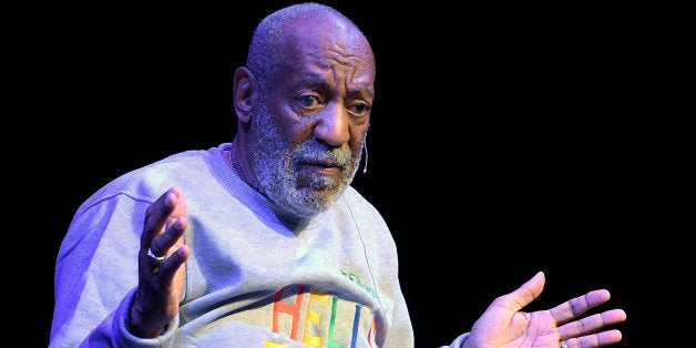 Comedian Bill Cosby performs during a show at the Maxwell C. King Center for the Performing Arts in Melbourne, Fla., Friday,
