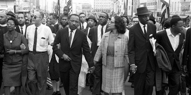 Dr. Martin Luther King, Jr. arrives in Montgomery, Alabama on March 25th 1965 at the culmination of the Selma to Montgomery March. Pictured from left, Ralph Bunche, Dr. Martin Luther King, Jr., Coretta Scott King, Rev. Fred Shuttlesworth, Hosea Williams. (Photo by Morton Broffman/Getty Images)