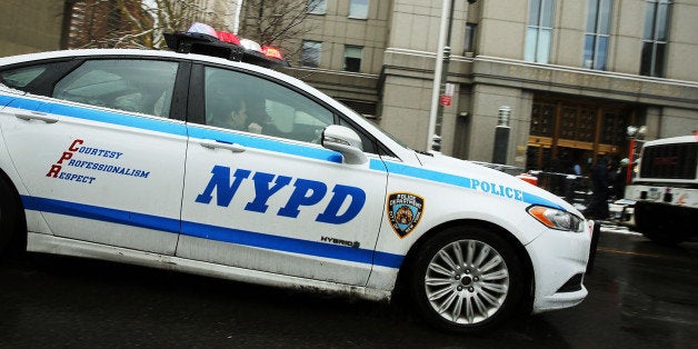 NEW YORK, NY - JANUARY 09: Police patrol outside of a Manhattan court house for the sentencing of convicted terrorist Mustaf