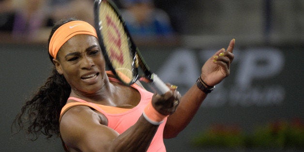 INDIAN WELLS, CA - MARCH 13: Serena Williams hits a forehand in her match against Monica Niculescu of Romania during the BNP