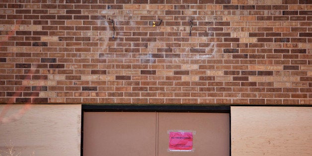 NORMAN, OK- MARCH 11: Marks are left above a door on the Sigma Alpha Epsilon fraternity house where the greek letters for '