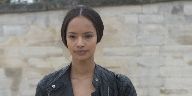 PARIS, FRANCE - OCTOBER 01: Model Malaika Firth on day 8 of Paris Fashion Week Spring/Summer 2014, Paris October 01, 2013 in Paris, France. (Photo by Kirstin Sinclair/FilmMagic)