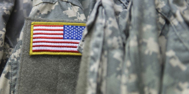 An american flag on the shoulder of the army clothing