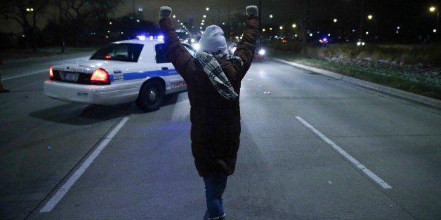 Protesters make their way onto the exit ramp of the southbound Lake Shore Drive following the announcement of the Ferguson gr